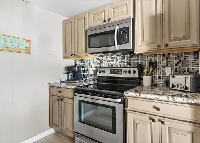Ferienhaus Calypso 2-bedroom With Ocean Views & Pool Access Ocean Beachfront Escape *